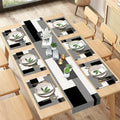 A Set of Geometric Tablecloth And Placemats, Featuring Abstract Art in White, Black, And Gray, Suitable for Everyday Dining Decor