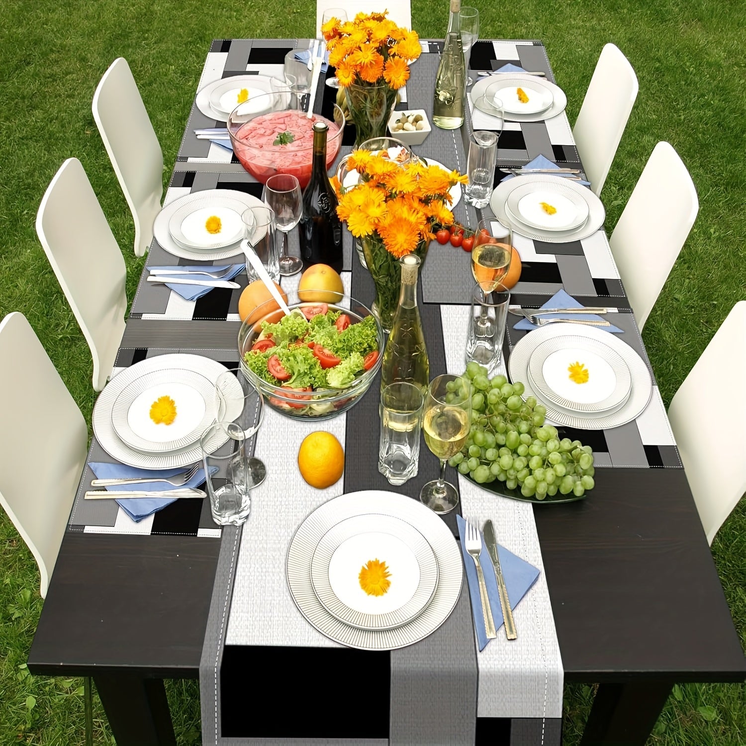 A Set of Geometric Tablecloth And Placemats, Featuring Abstract Art in White, Black, And Gray, Suitable for Everyday Dining Decor